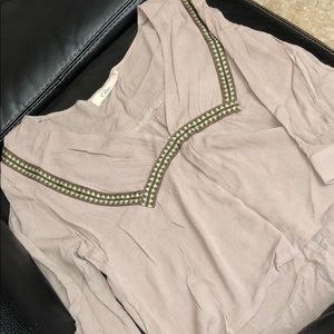 Cute high low top. Never worn